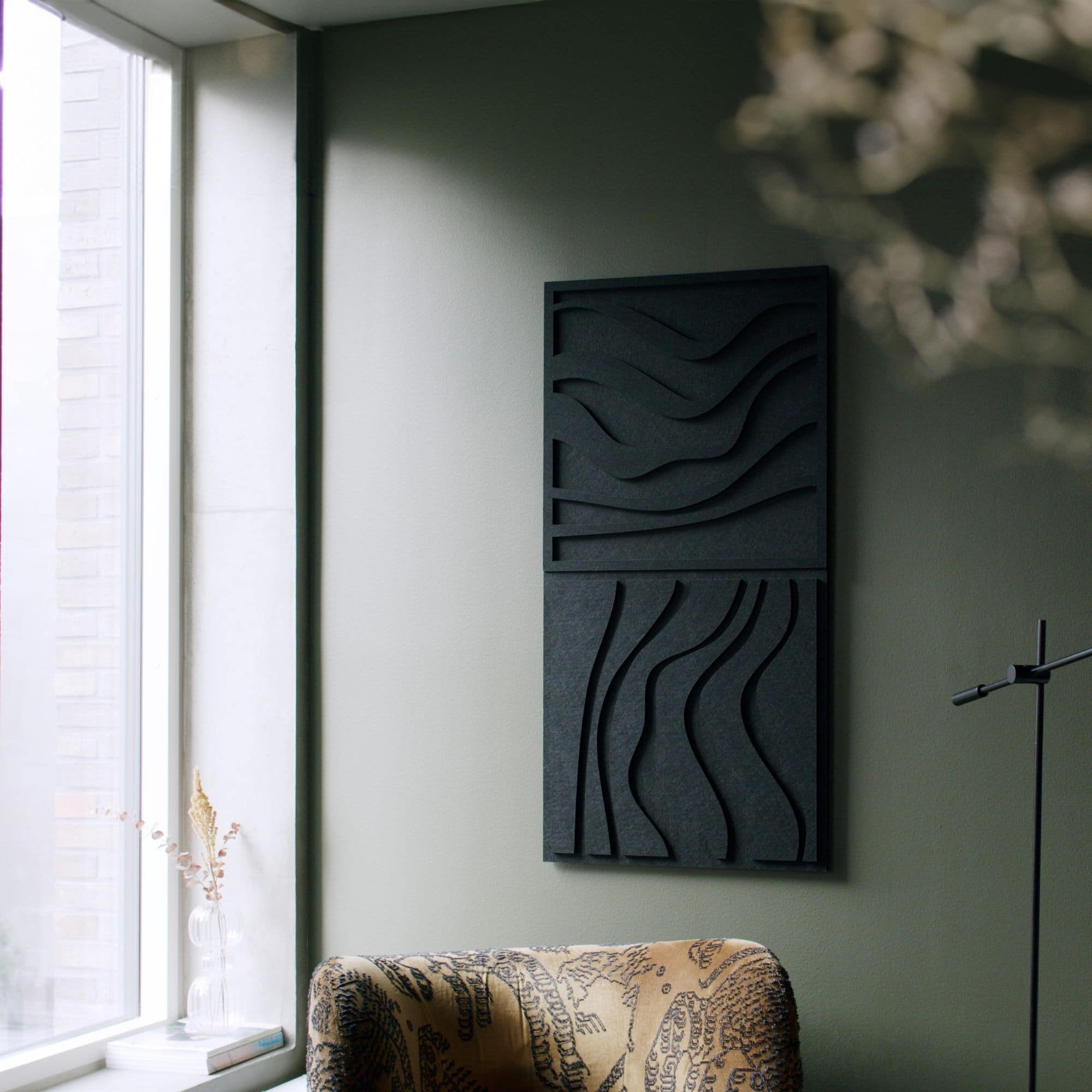 Living room featuring Arturel black Wave tile acoustic panels for sound absorption